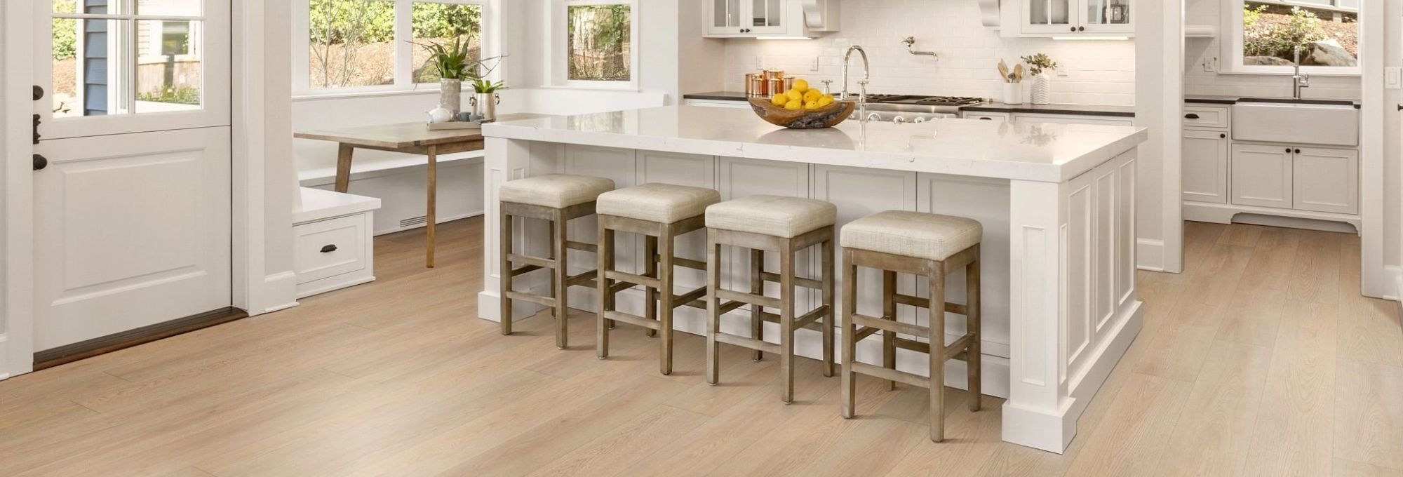 A table having big chairs around it from Color World Paint and Wallcovering Center in Pittston, PA